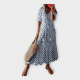 Vintage šaty s výšivkou a V výstřihem