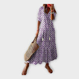 Vintage šaty s výšivkou a V výstřihem