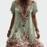 Šaty ve vintage stylu s krátkými rukávy a elegantní květinovou výšivkou