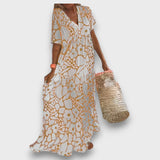 Dlouhé šaty s květinovým vzorem a knoflíky