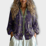 Uvolněná blůza s knoflíky vpředu a uměleckými detaily