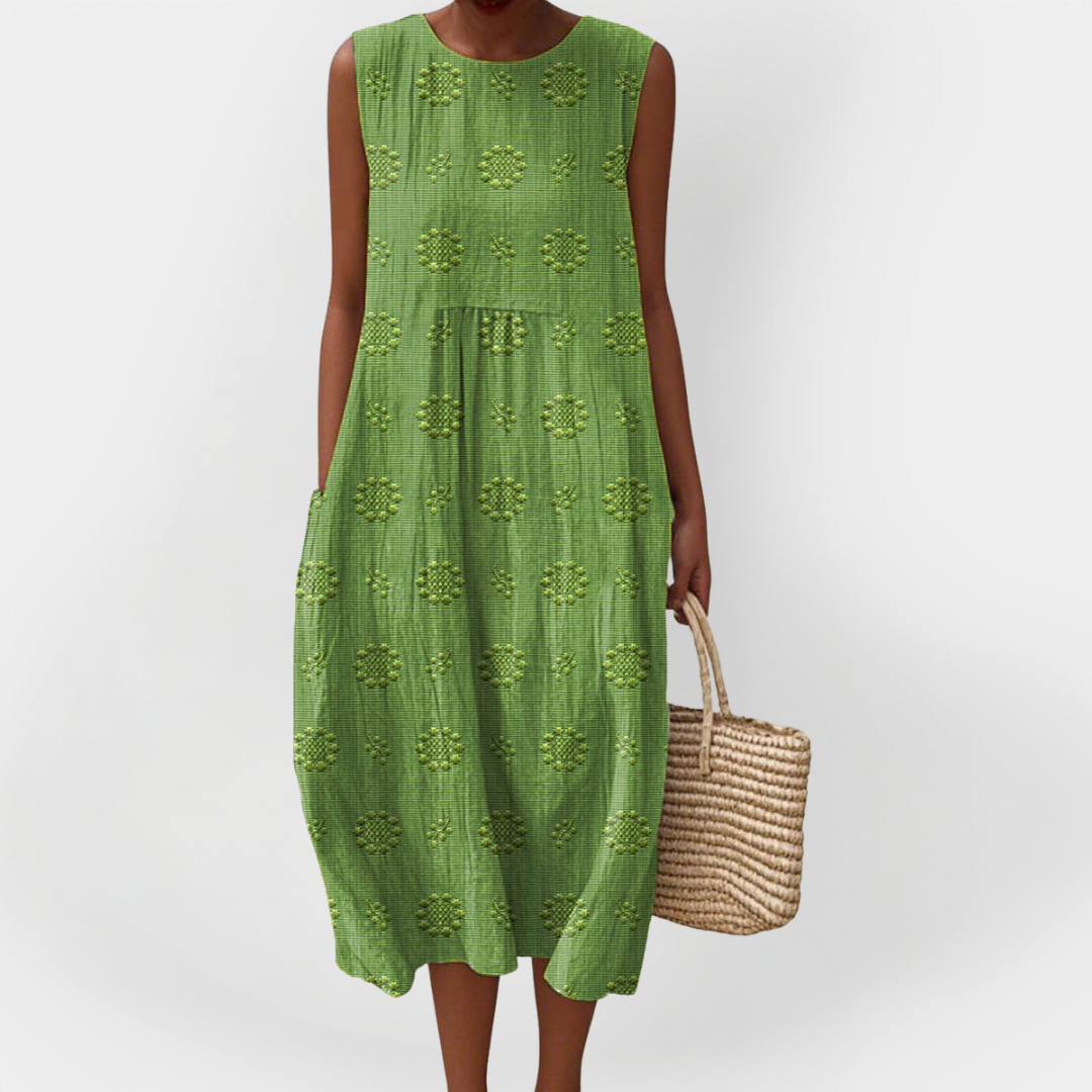 Elegantní bezrukávové bavlněné šaty s kapsami