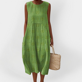 Elegantní bezrukávové bavlněné šaty s kapsami