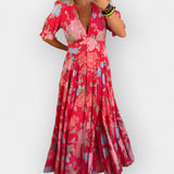 Světle květinové šaty s kapsami