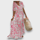 Dlouhé šaty s květinovým vzorem a knoflíky