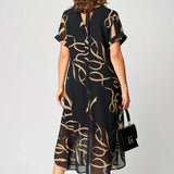 Vzdušné šaty s lineárními vzory a výstřihem do V