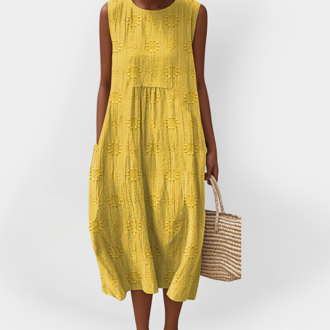 Elegantní bezrukávové bavlněné šaty s kapsami