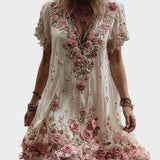 Šaty ve vintage stylu s krátkými rukávy a elegantní květinovou výšivkou