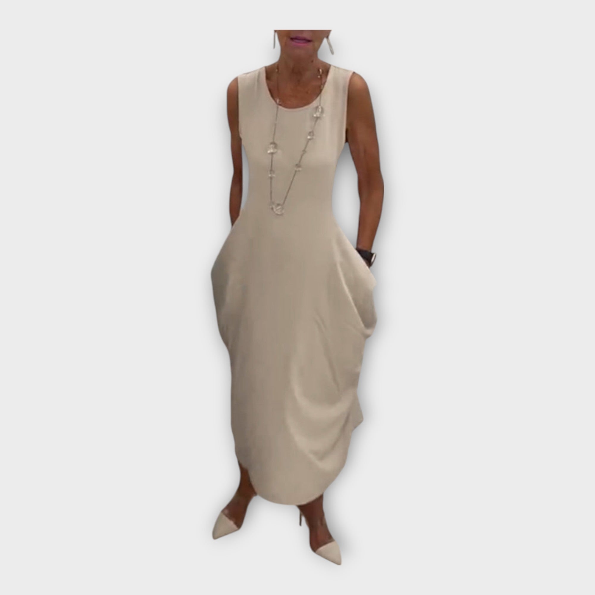 Lehké šaty s moderní siluetou a kapsami