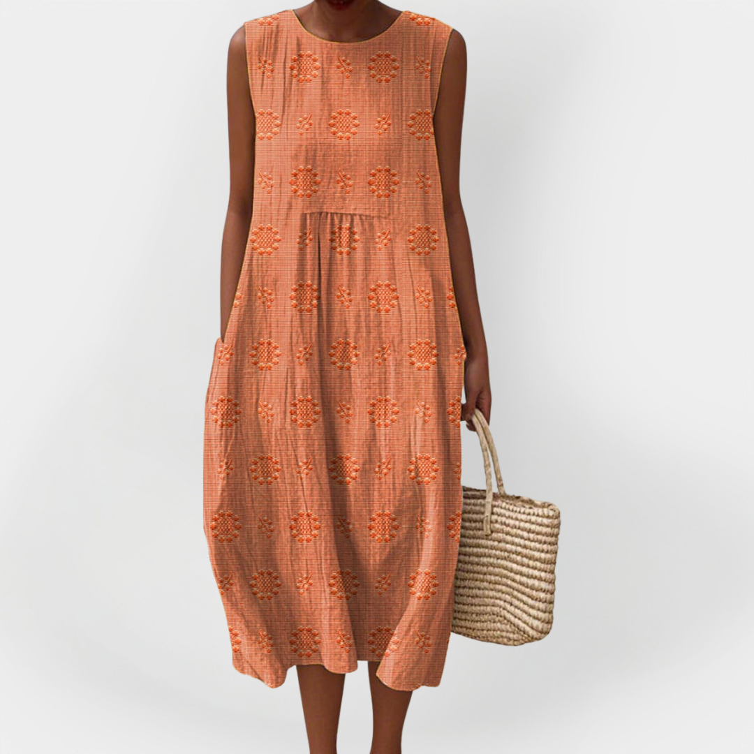 Elegantní bezrukávové bavlněné šaty s kapsami