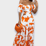 Šaty zvýrazňující siluetu vyrobené z luxusní látky