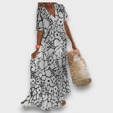 Dlouhé šaty s květinovým vzorem a knoflíky