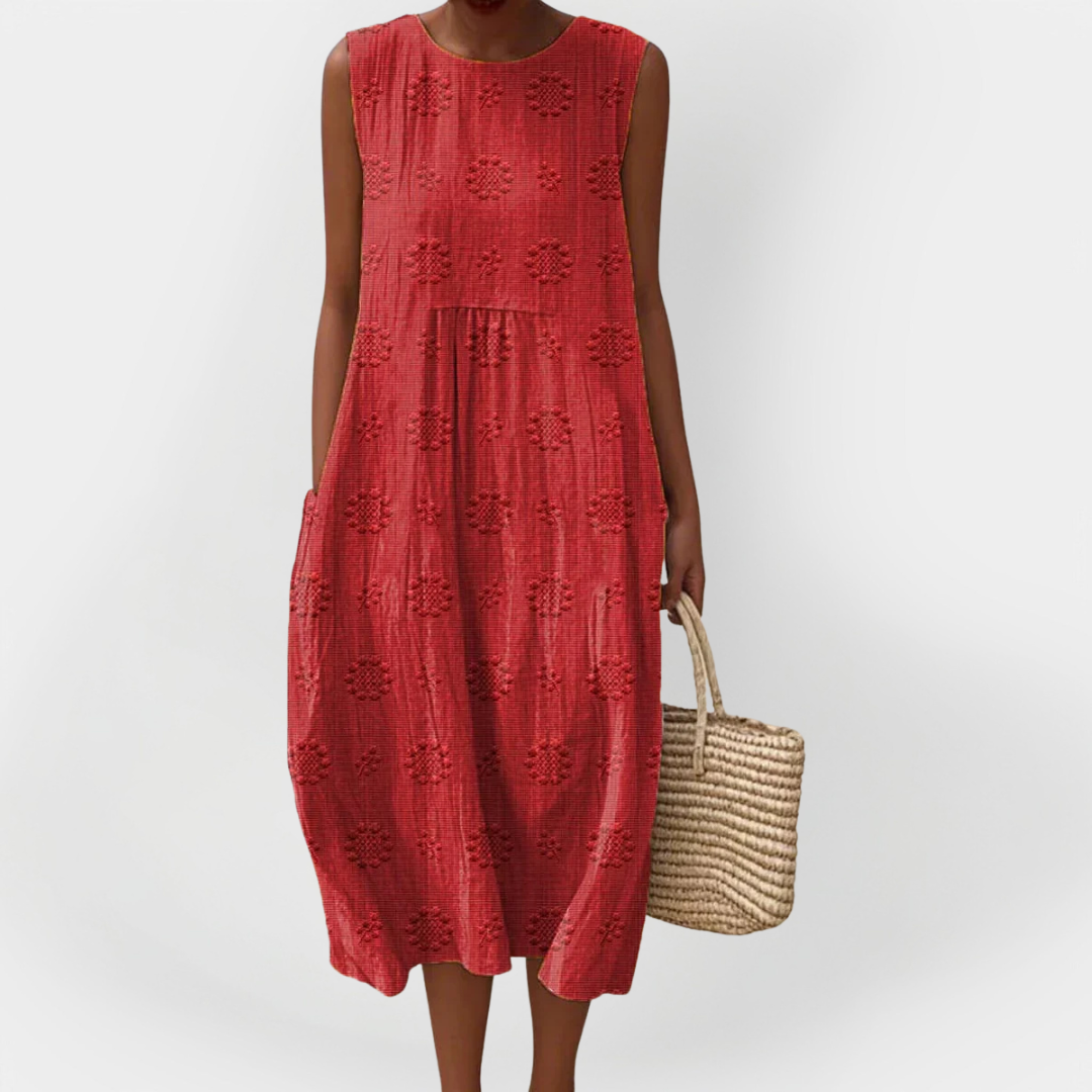 Elegantní bezrukávové bavlněné šaty s kapsami