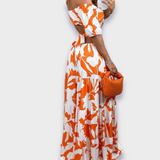 Šaty zvýrazňující siluetu vyrobené z luxusní látky