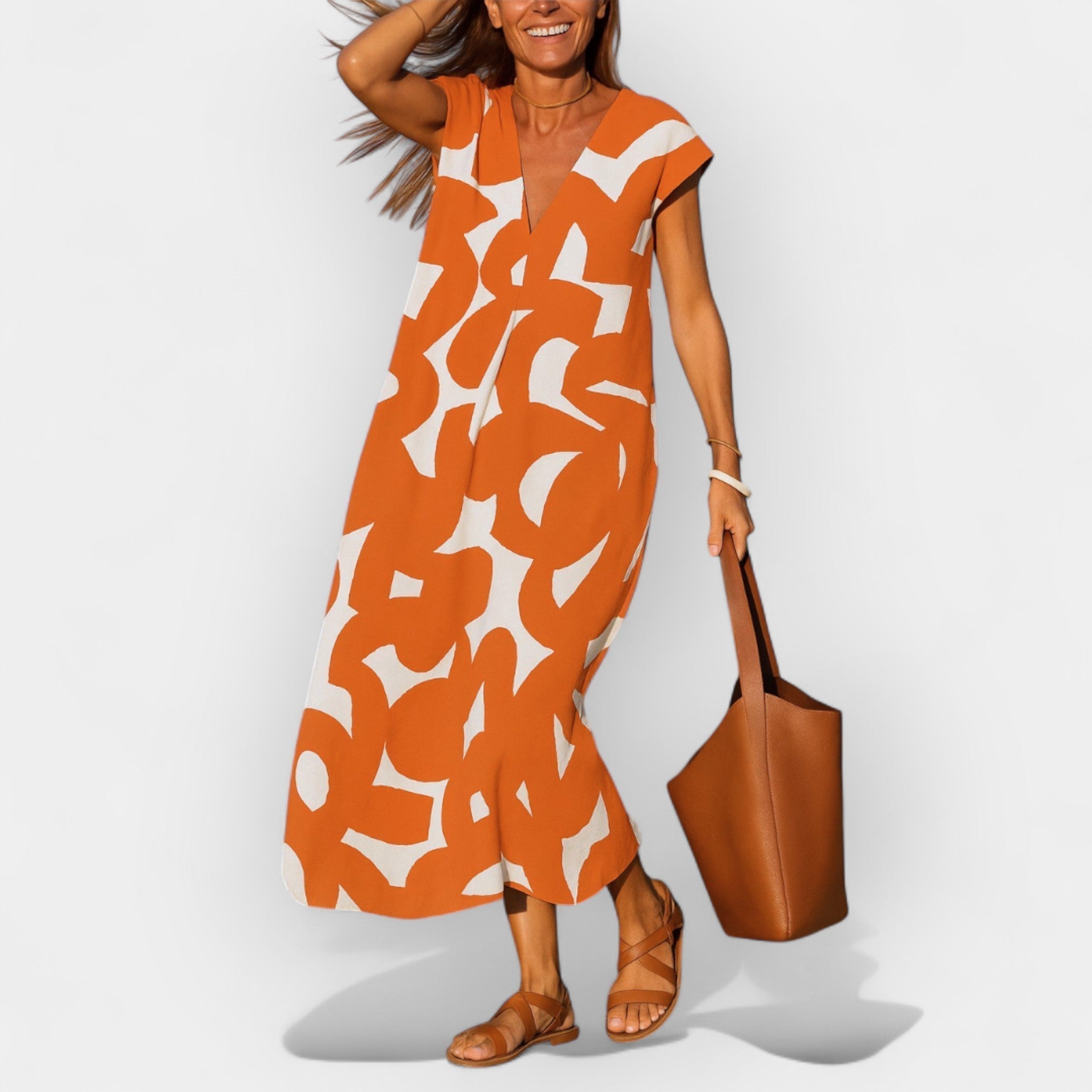 Vzdušné šaty s výstřihem do V a moderním designem