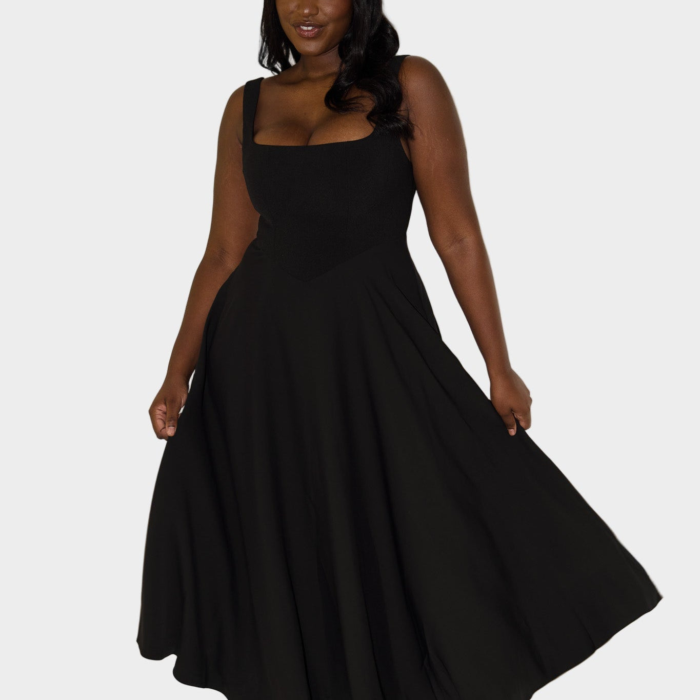 Nadčasové vzdušné midi šaty s elegantní linií a přirozeným pohybem