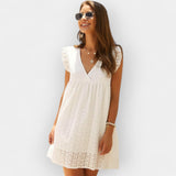 Letní šaty s hidden šortkami a kapsami