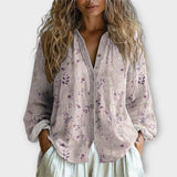 Uvolněná blůza s knoflíky vpředu a uměleckými detaily