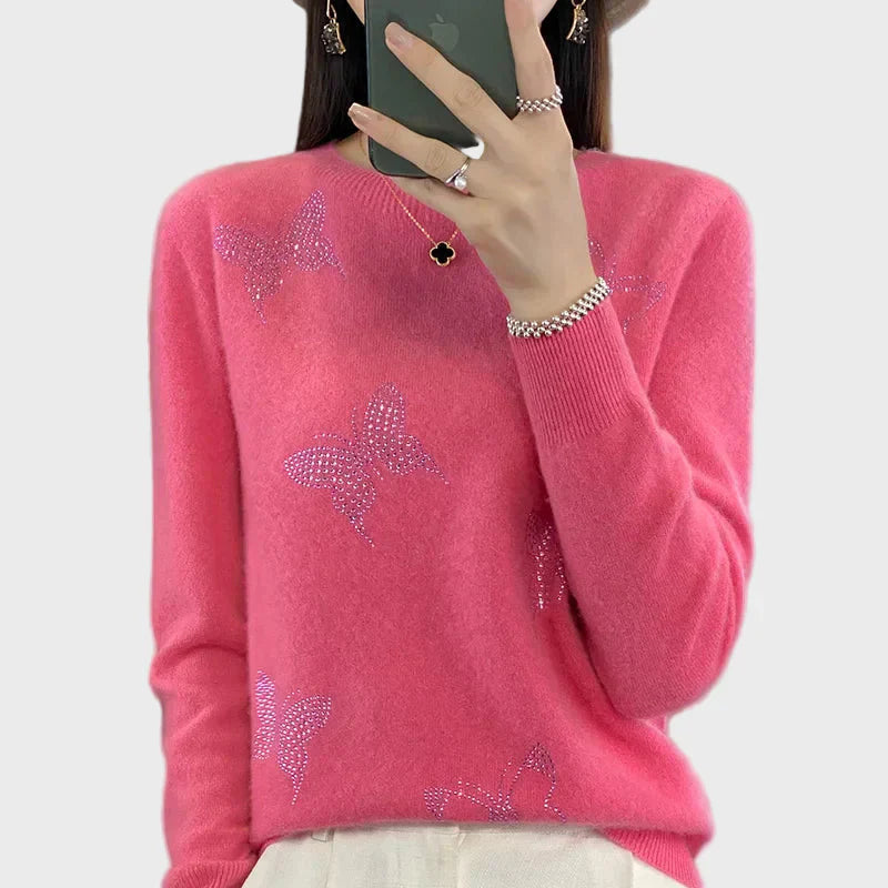 Pletený rolák s motivem motýla