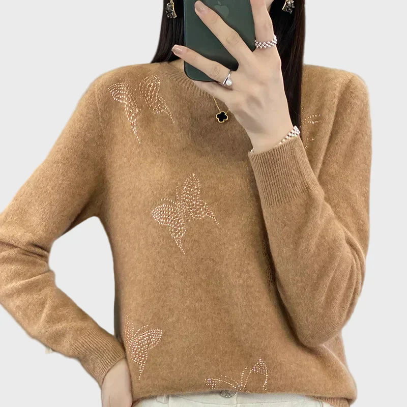 Pletený rolák s motivem motýla