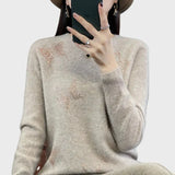 Pletený rolák s motivem motýla