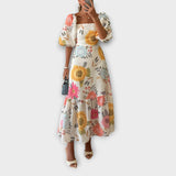 Šaty s nafouknutými rukávy v květinovém stylu