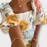 Šaty s nafouknutými rukávy v květinovém stylu