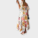 Šaty s nafouknutými rukávy v květinovém stylu