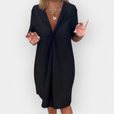 Elegantní šaty s V výstřihem a dekorativním lemem