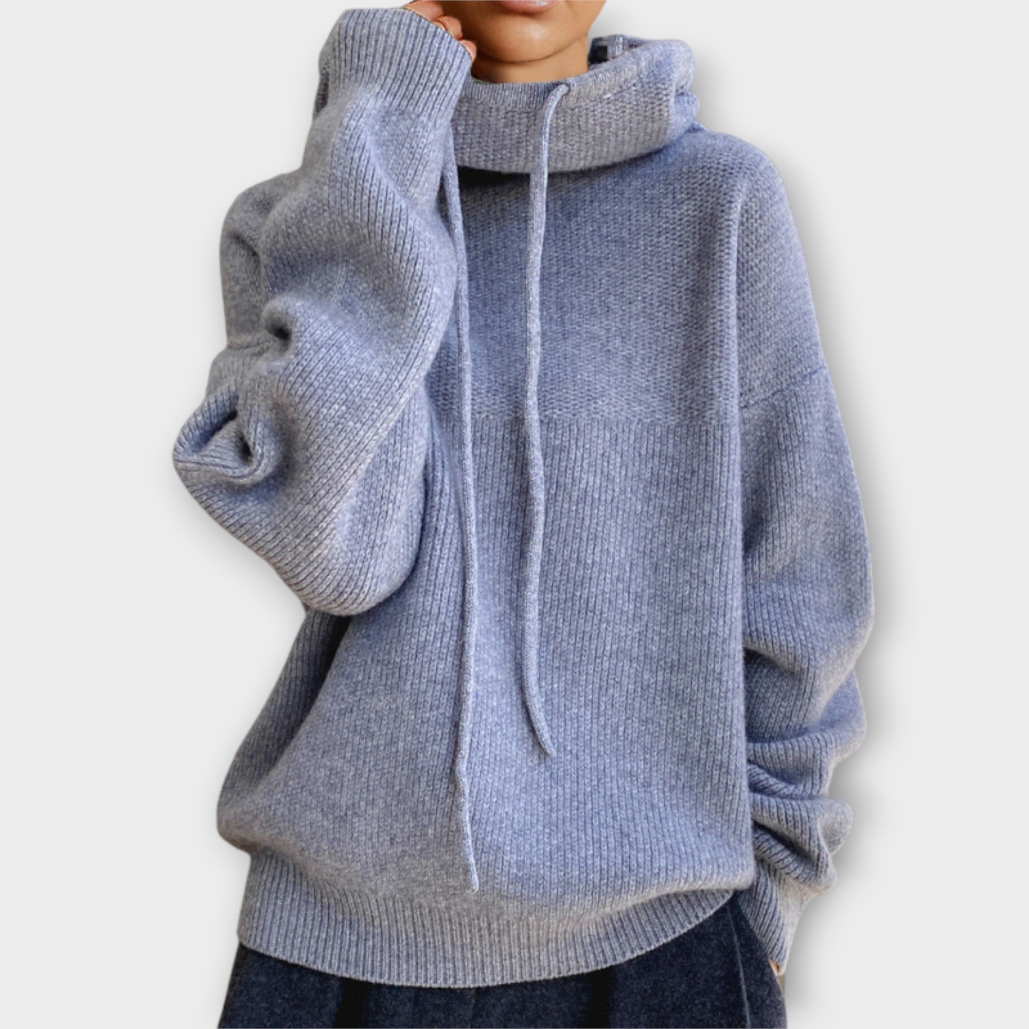 Pohodlný uvolněný svetr s rolákem a šňůrkou